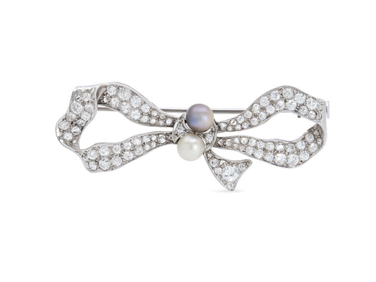 Antique Edwardian Diamond and Natural Pearl Bow Brooch in Platinum
