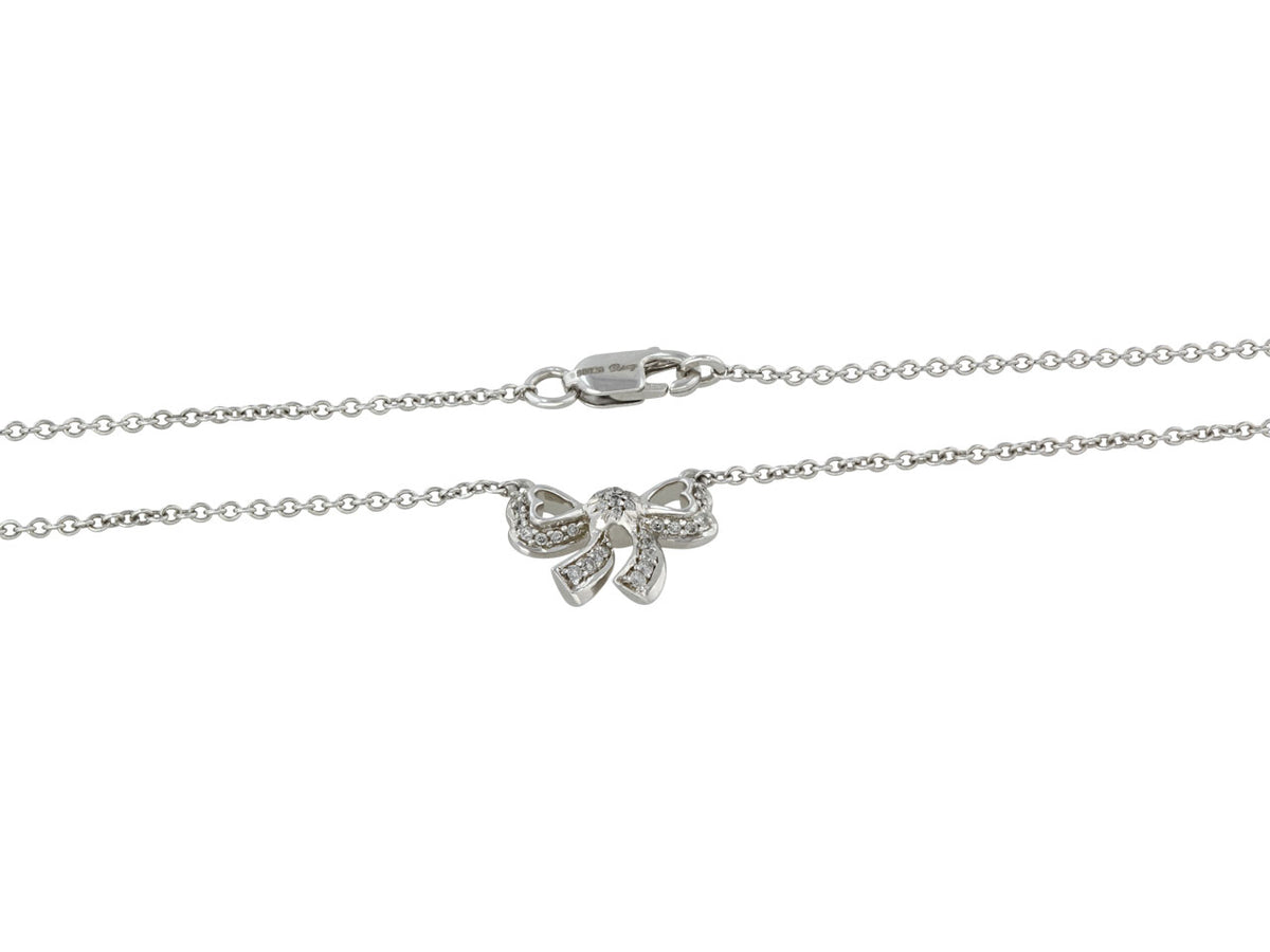 White gold diamond bow pendant necklace
