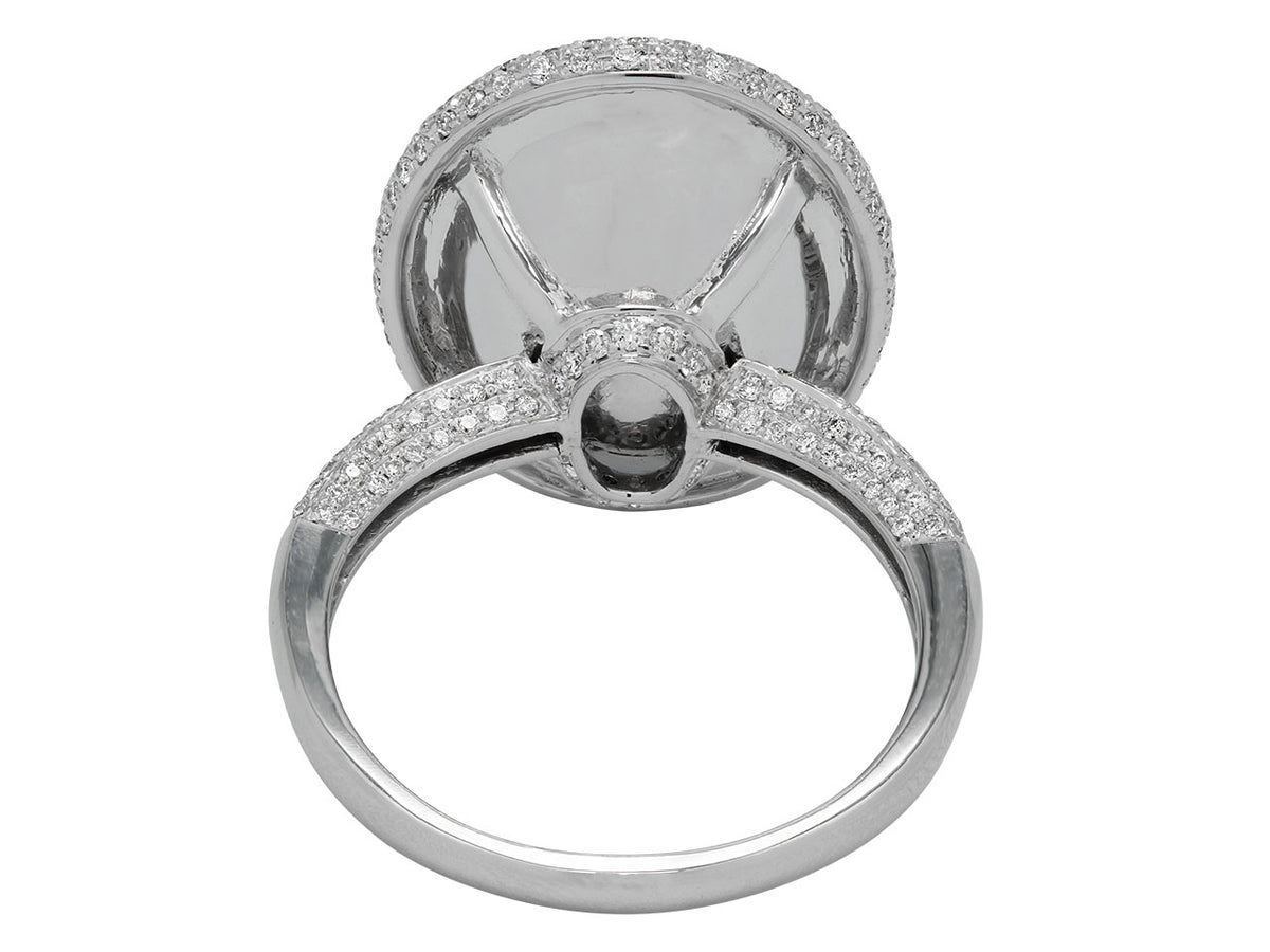 Underside view of 18K white gold ring with pavé shoulders