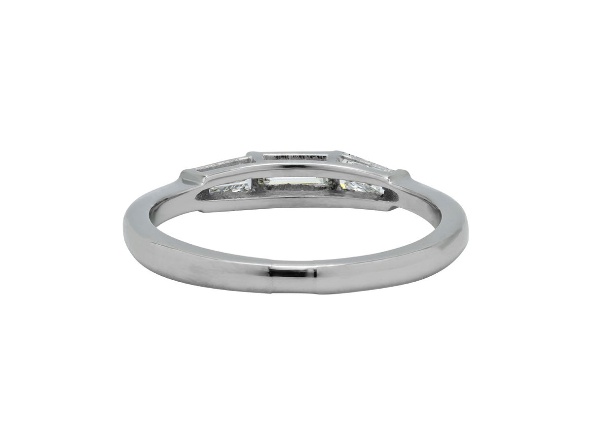 Platinum ring with baguette diamond setting