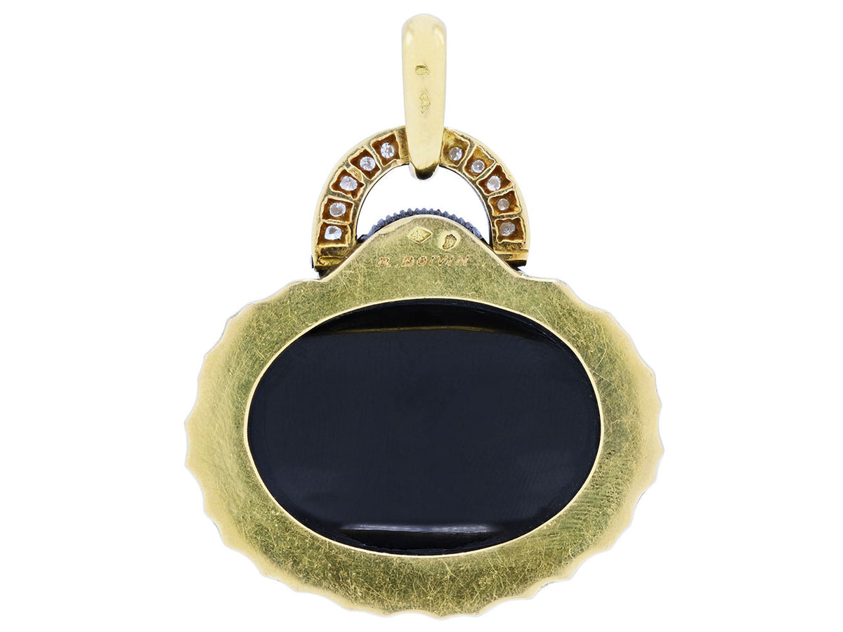 Back view of an onyx pendant with diamond set bail