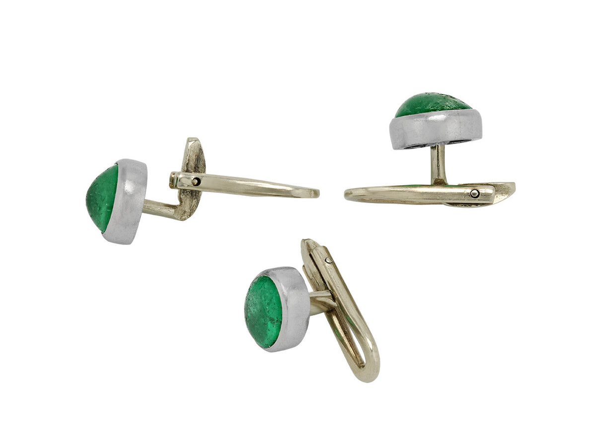 Platinum cufflinks and shirt studs with cabochon emeralds