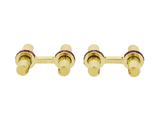 Pair of 18K gold cufflinks with ruby accents