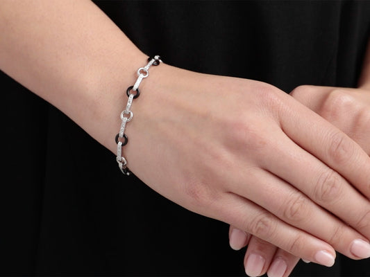 Black onyx and diamond bracelet in platinum