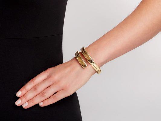 Italian 18K gold double coil bracelet on wrist