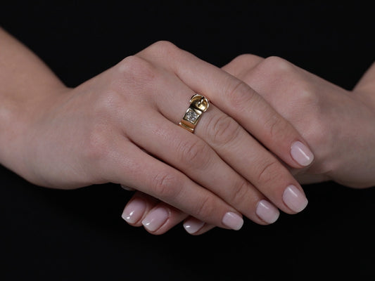 Antique Victorian diamond buckle ring worn on hand