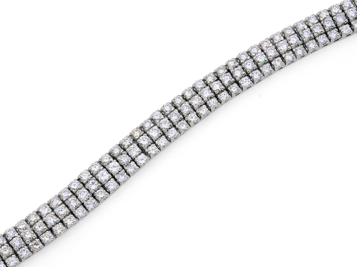 Close view of three row diamond bracelet in 18K white gold