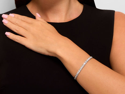 Platinum diamond line bracelet worn on the wrist