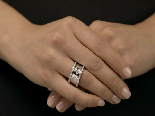 Wide diamond ring in polished 18k white gold
