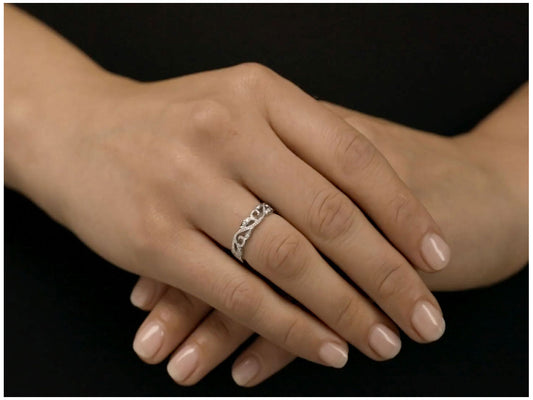 Diamond ivy leaf ring in 18K white gold worn on hand