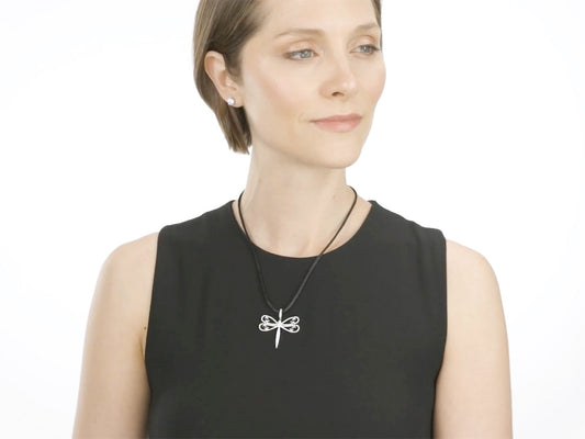 Woman modeling a diamond dragonfly pendant
