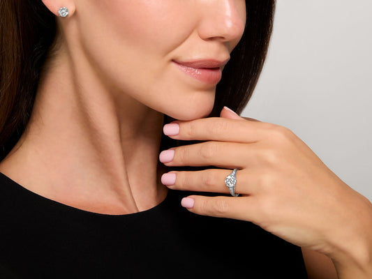 Woman wearing an Art Deco diamond solitaire ring