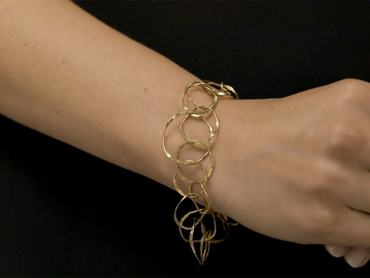 18K gold bracelet with hammered spherical links