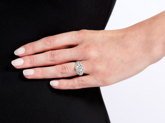Close-up of a hand wearing an Art Deco diamond ring