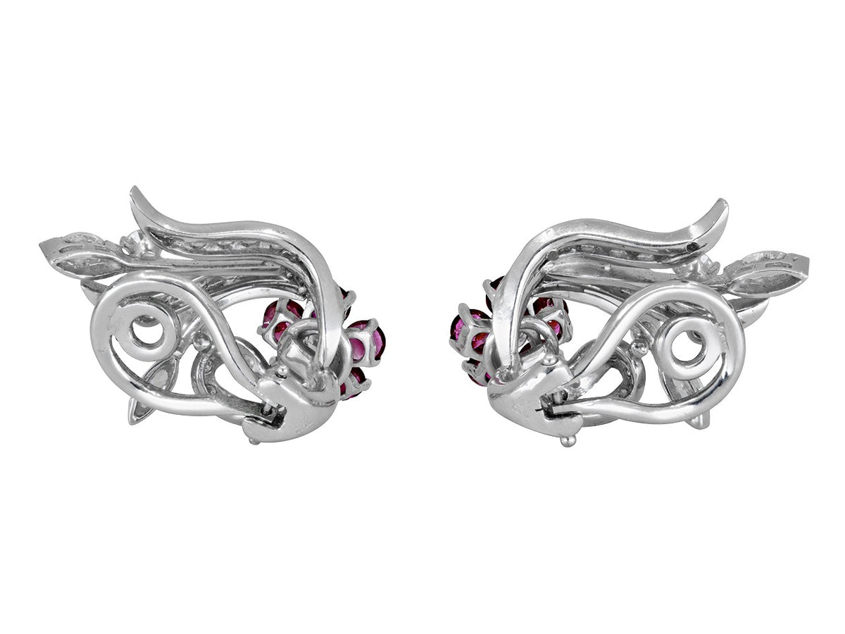 Pair of platinum floral earrings with ruby accents