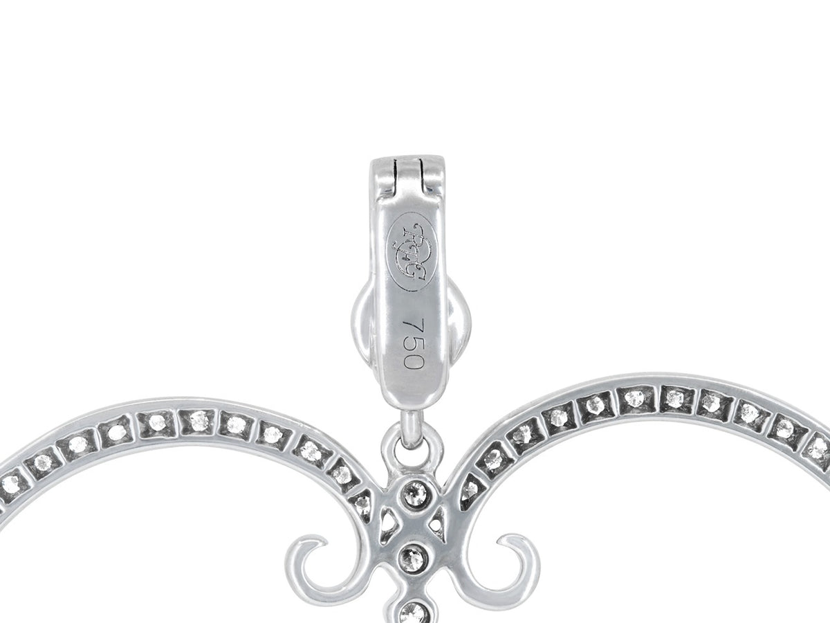 Diamond-set white gold heart pendant bail detail