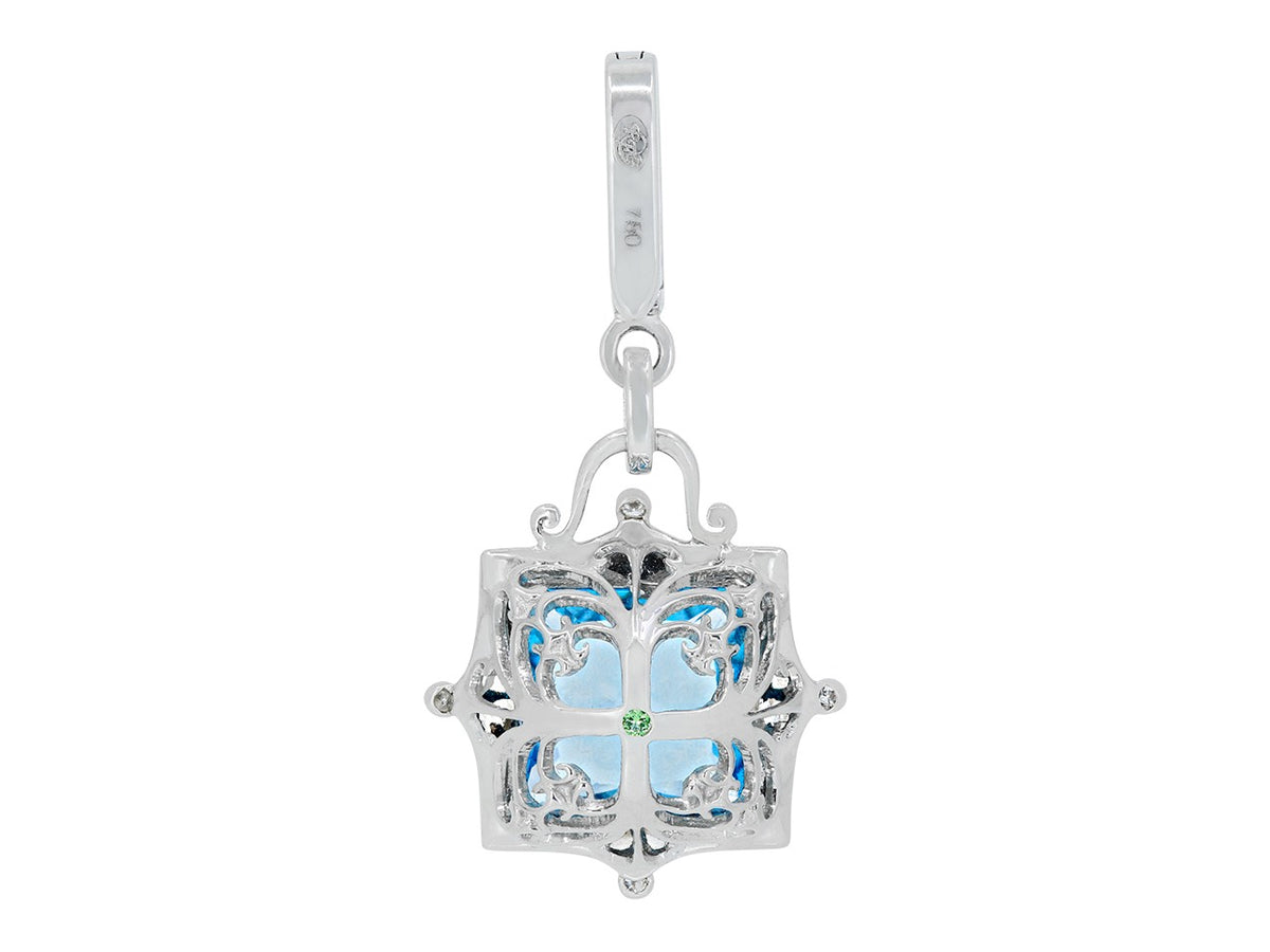 Ornate white gold pendant with blue topaz and diamonds