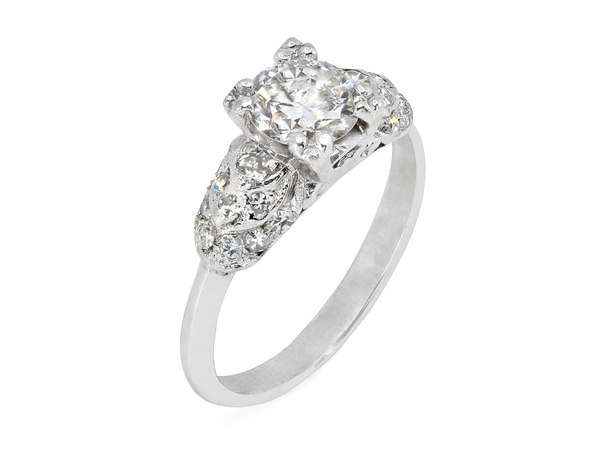 Platinum ring with a transitional cut diamond and stepped shoulders