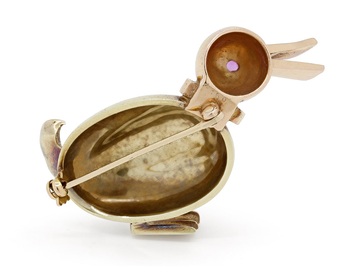 Retro duck brooch in 14K yellow and rose gold with ruby accents