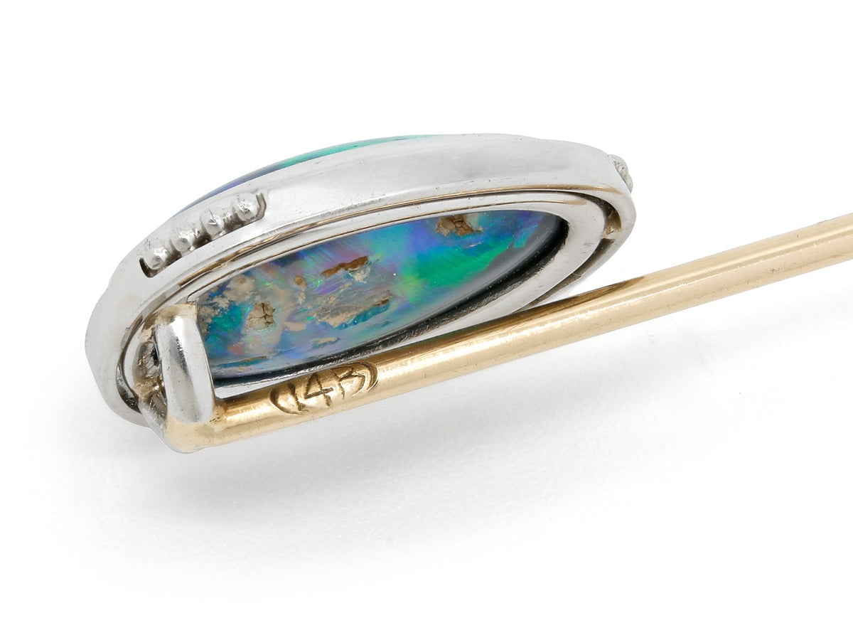 Black opal stick pin with platinum bezel and 14K gold stem