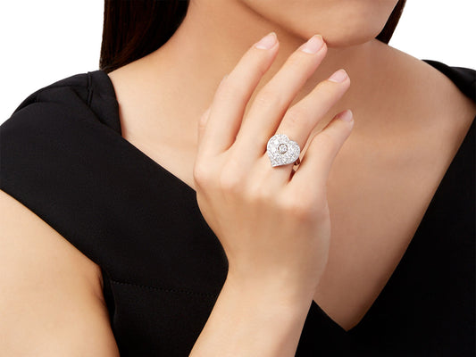 Woman wearing a pavé diamond heart ring