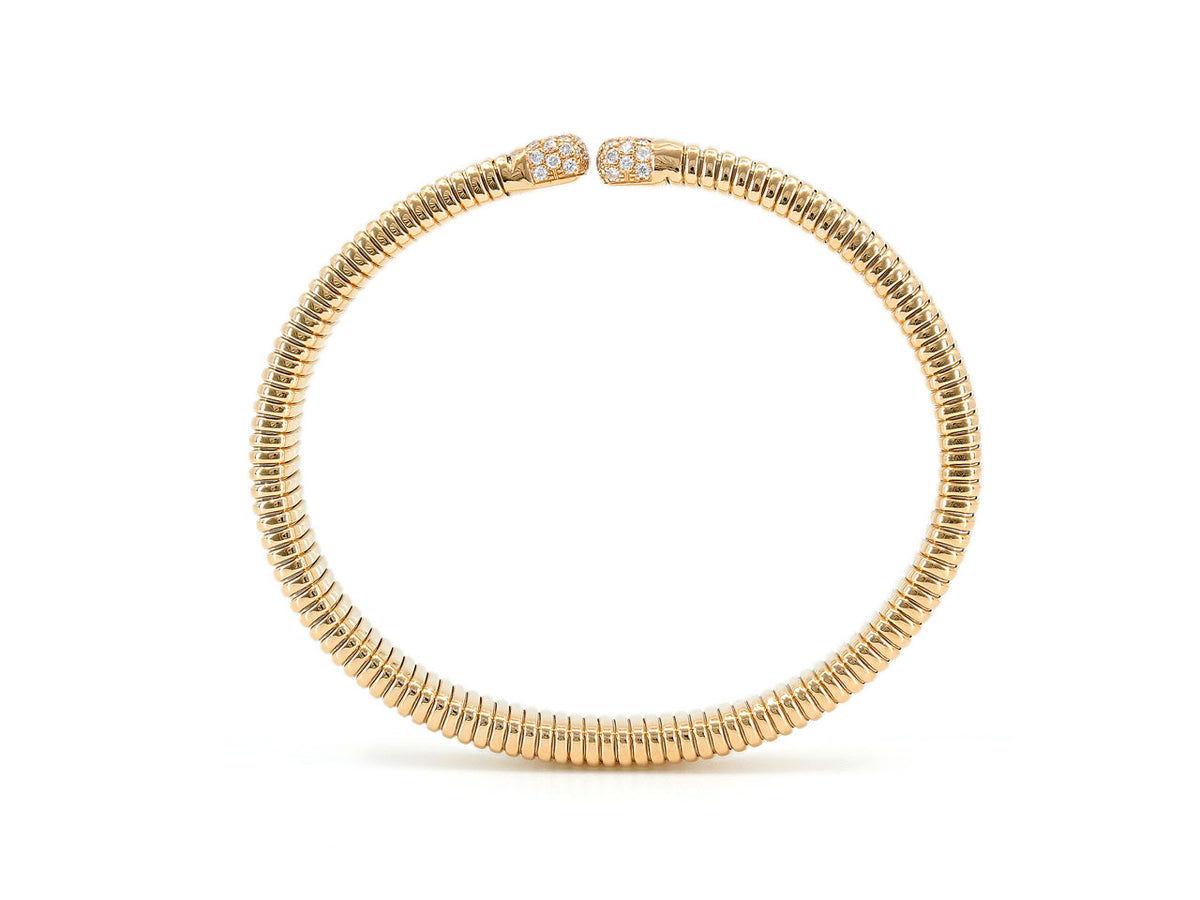 18K gold tubogas bangle with diamond set terminals