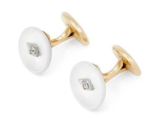 Mother of pearl cufflinks with diamond centers in yellow gold