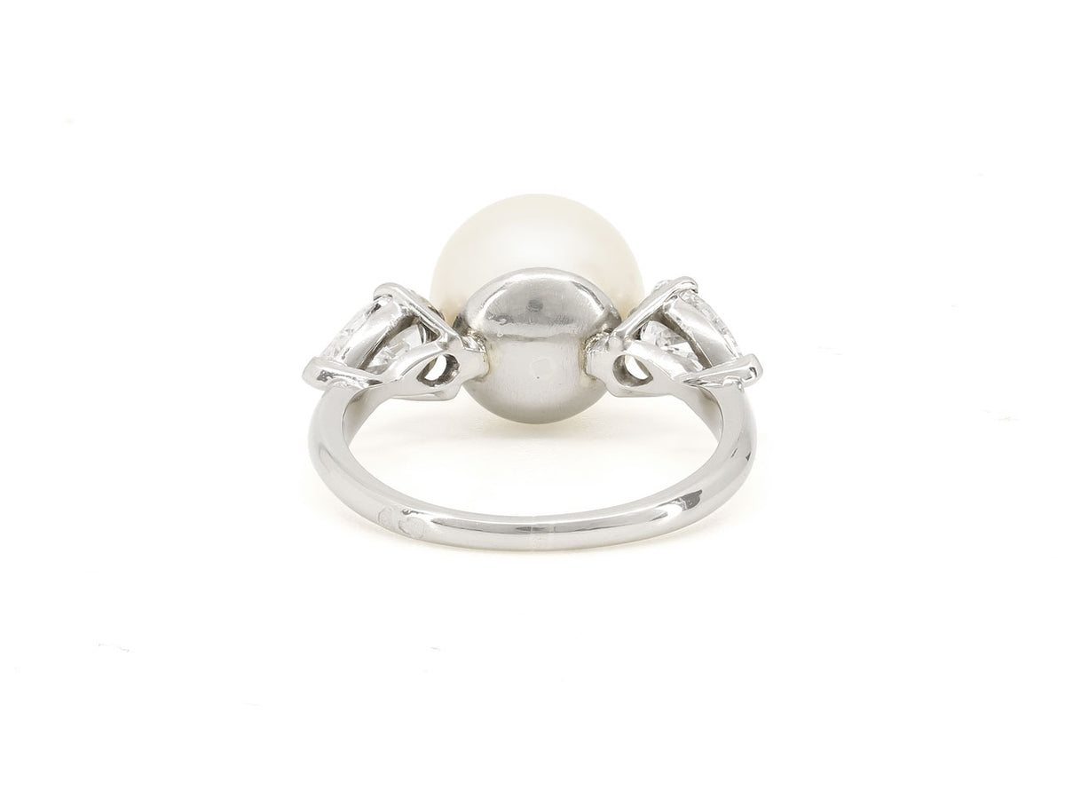 Platinum ring with Akoya pearl and pear shape diamonds