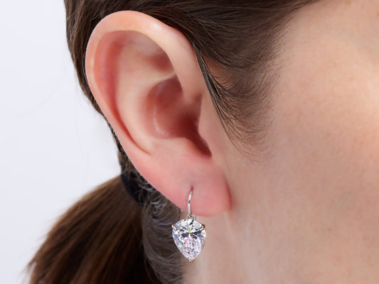 Pear shape diamond drop earring on a platinum French hook