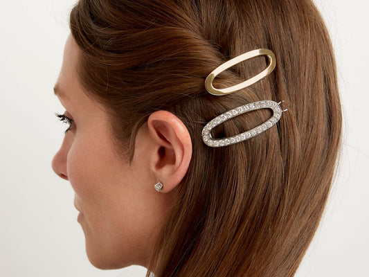Woman wearing yellow and white gold diamond barrettes