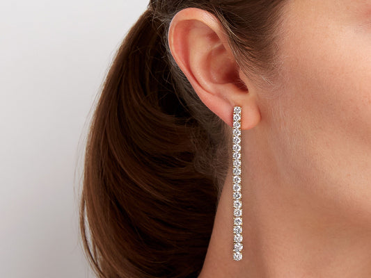 Long diamond line earring in 18K yellow gold