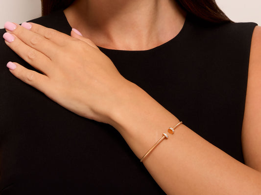 Rose gold tubogas bracelet with nail head terminals