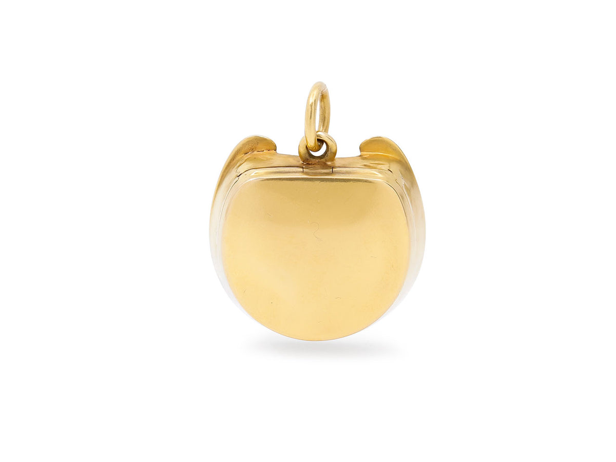 Reverse view of an 18K gold hinged locket pendant