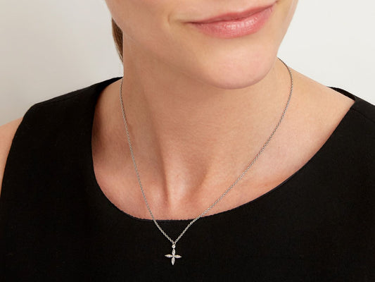 Platinum diamond flower pendant necklace on model