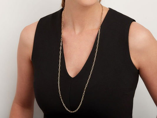 Long 18K gold cable link chain necklace on model