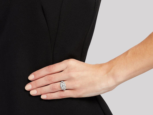 Hand wearing an Art Deco platinum diamond ring