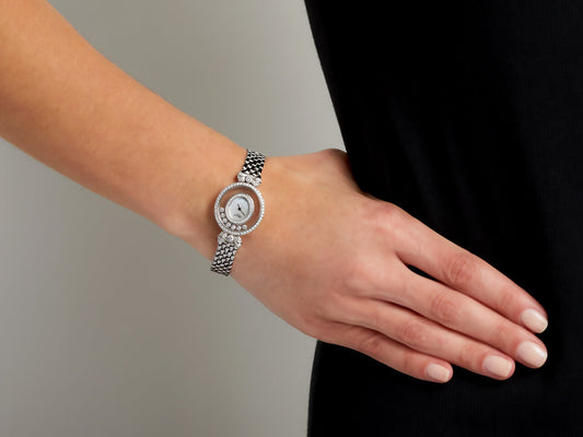 Chopard diamond watch with white gold bracelet on wrist
