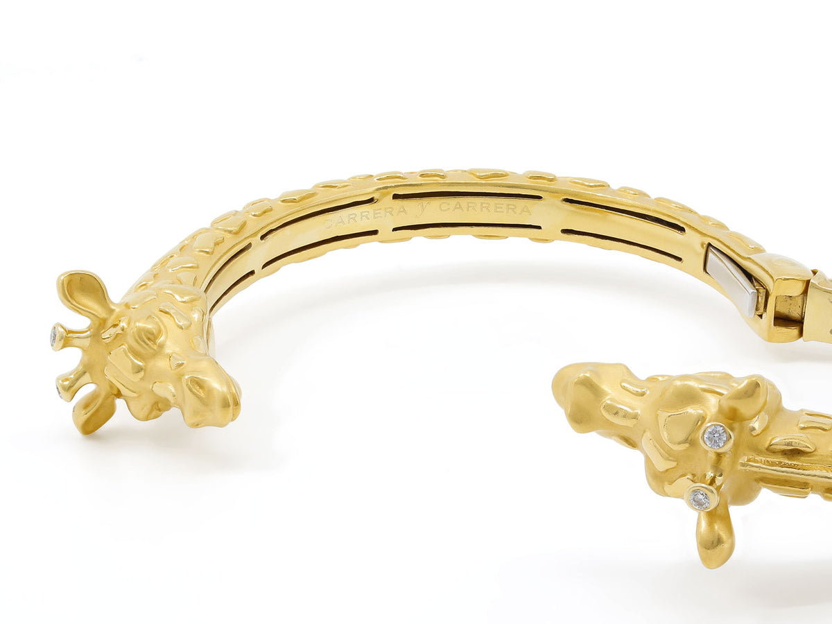 Hinged 18K gold giraffe bangle with diamond accents