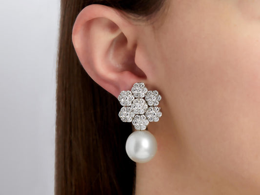 Diamond flower earring with dangling white pearl
