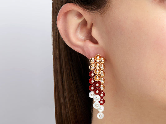 Dangling carnelian and mother of pearl earring