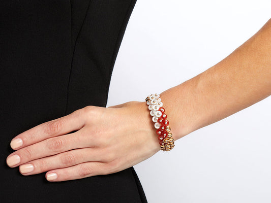 Carnelian mother of pearl and diamond bracelet on wrist