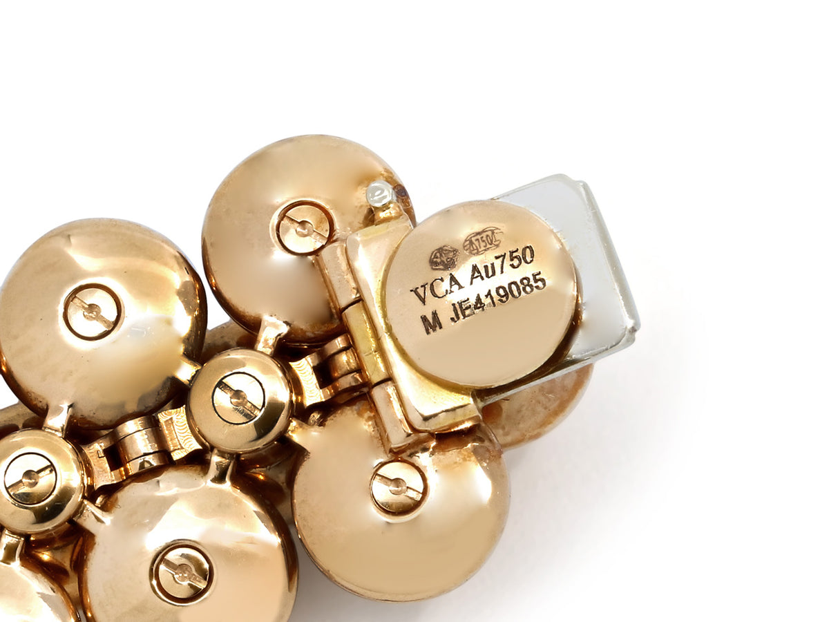 Close-up of rose gold bracelet clasp with VCA hallmark