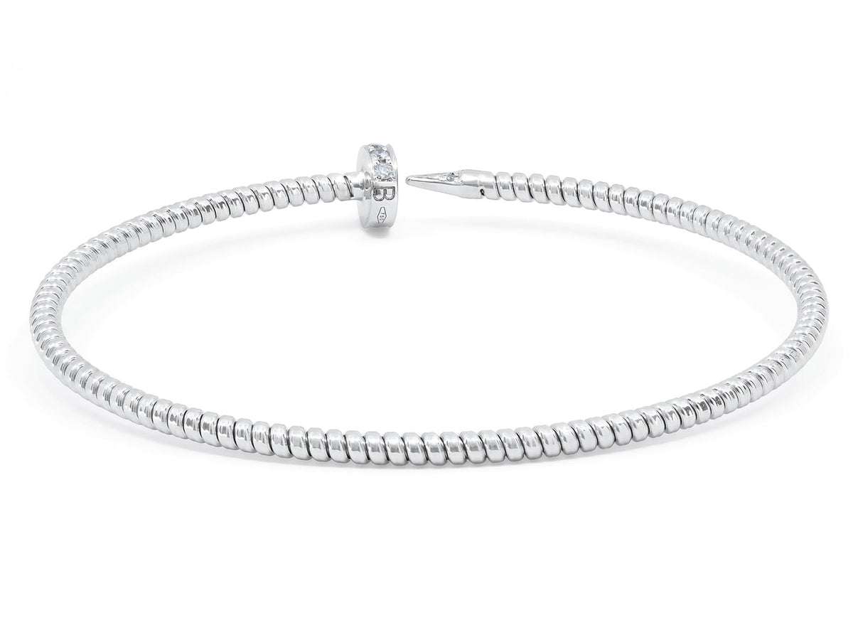 Slim 18K white gold tubogas nail bracelet with diamond accents