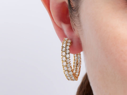 Diamond hoop earring with two rows of diamonds in 18K yellow gold
