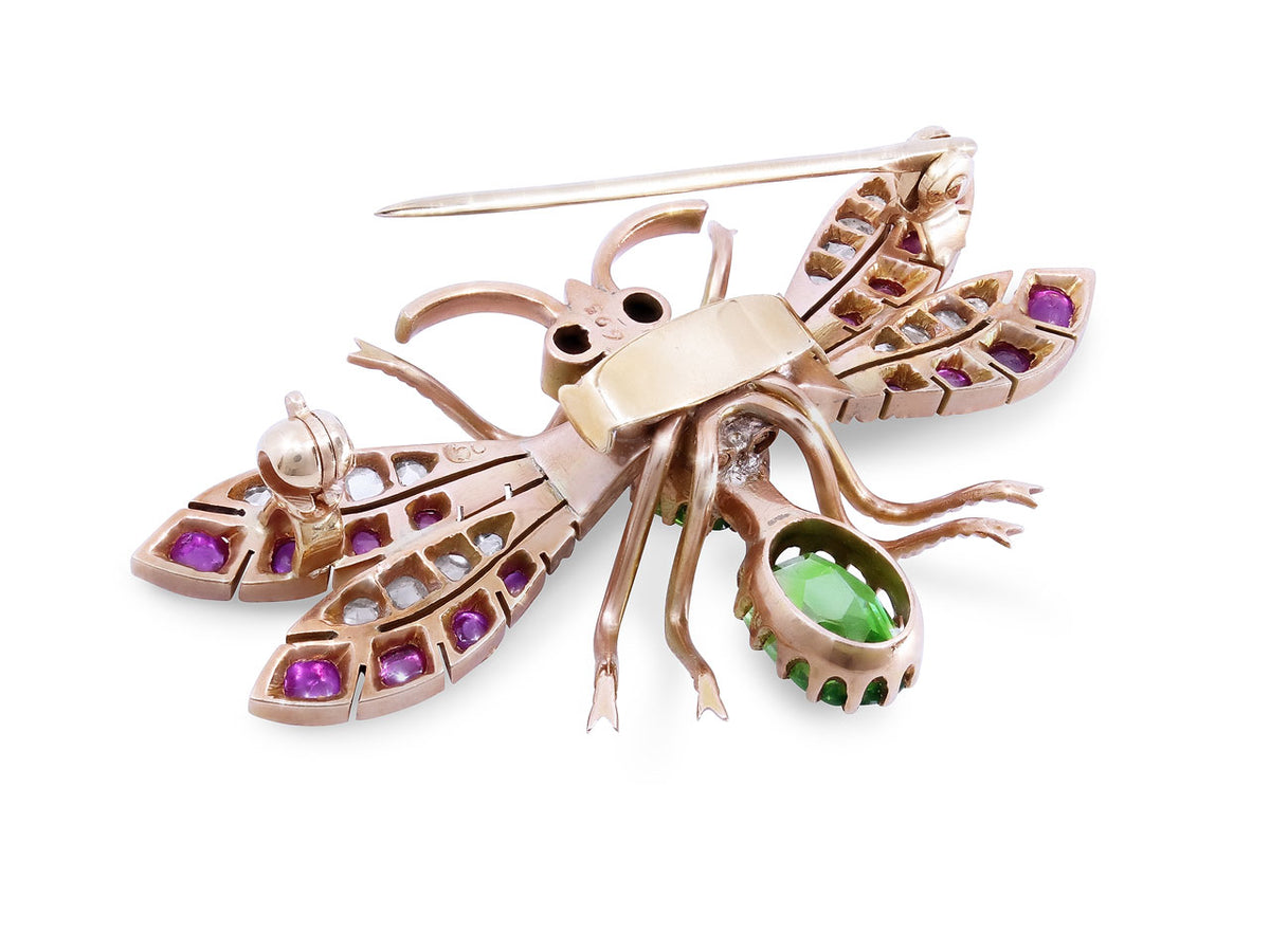 Rose gold insect brooch with ruby wings and green body