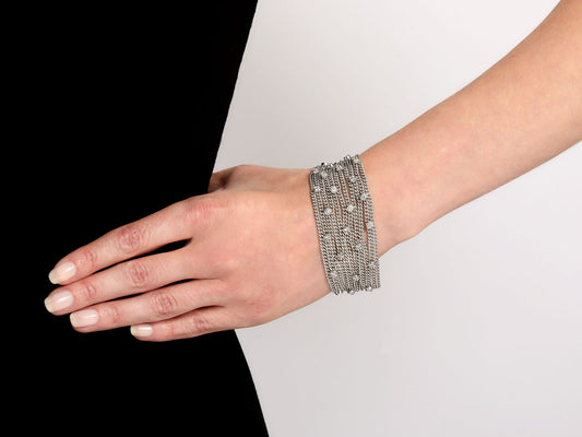 Diamond chain bracelet in 18K white gold on wrist