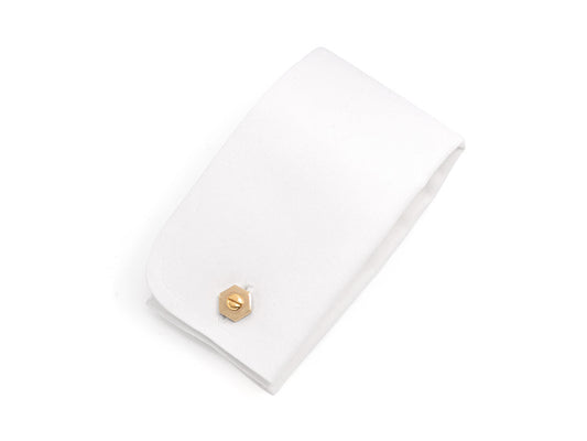 White jewelry box with a gold screw head cufflink