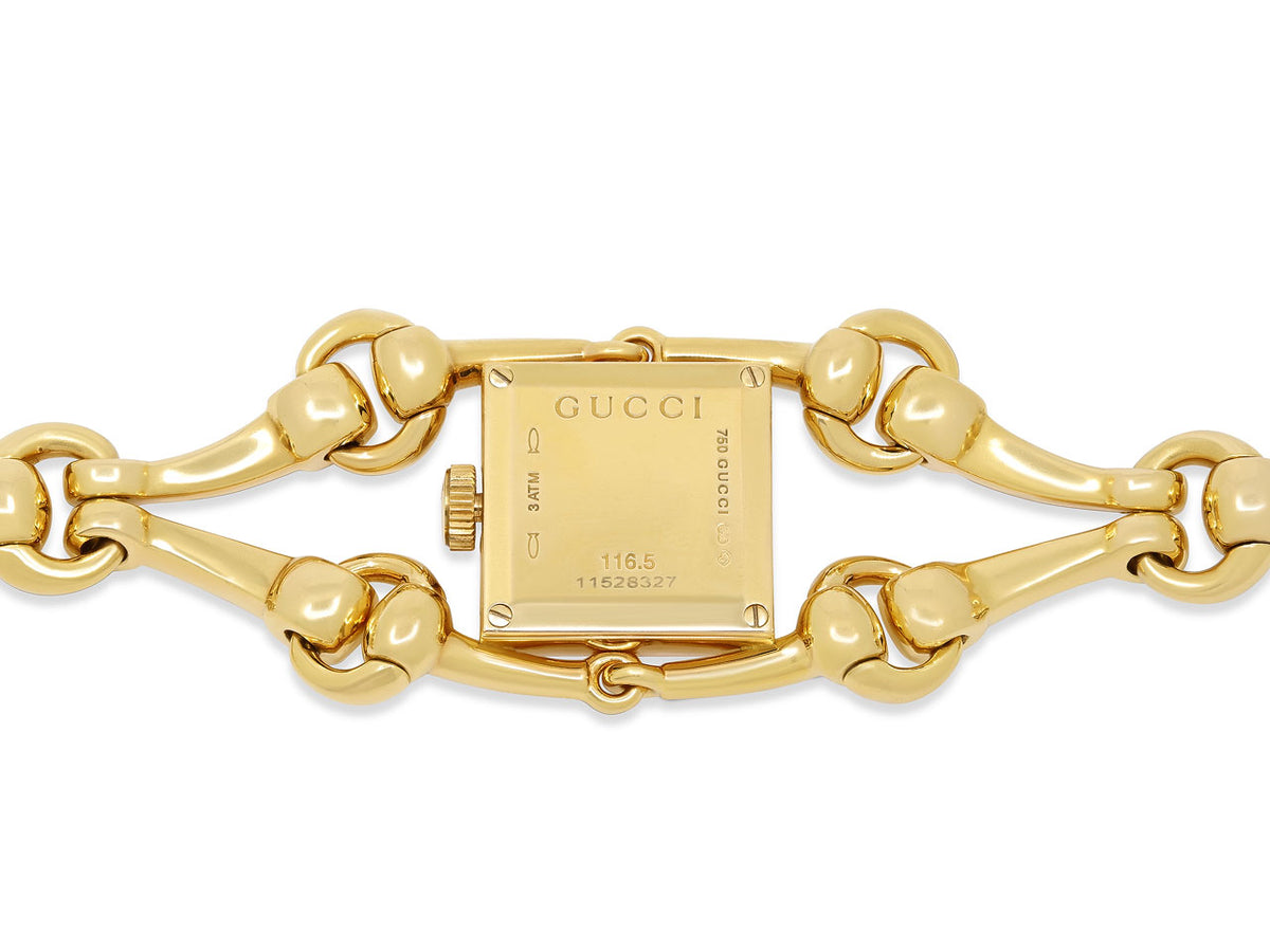 Back of 18K gold Gucci watch with horsebit links