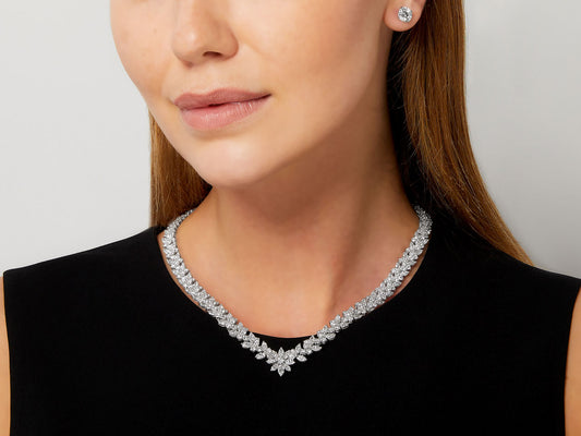 Diamond floral necklace in 18K white gold on model