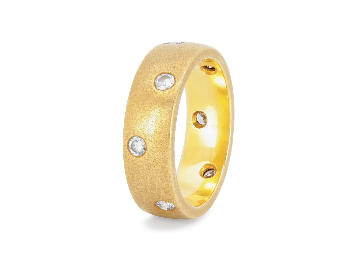 Brushed 18k gold ring with flush set diamonds